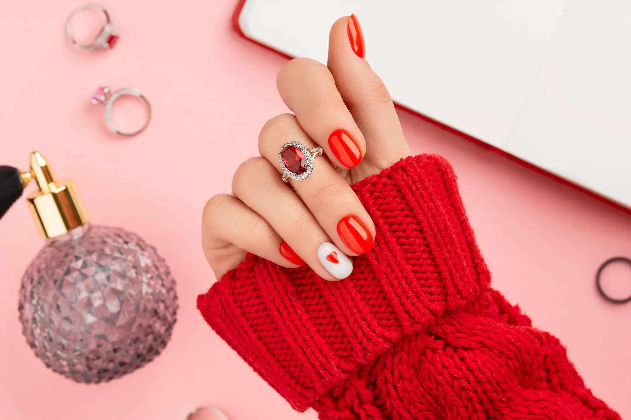 Hand with red manicure and ring 2026 03 13 01 58 36 utc