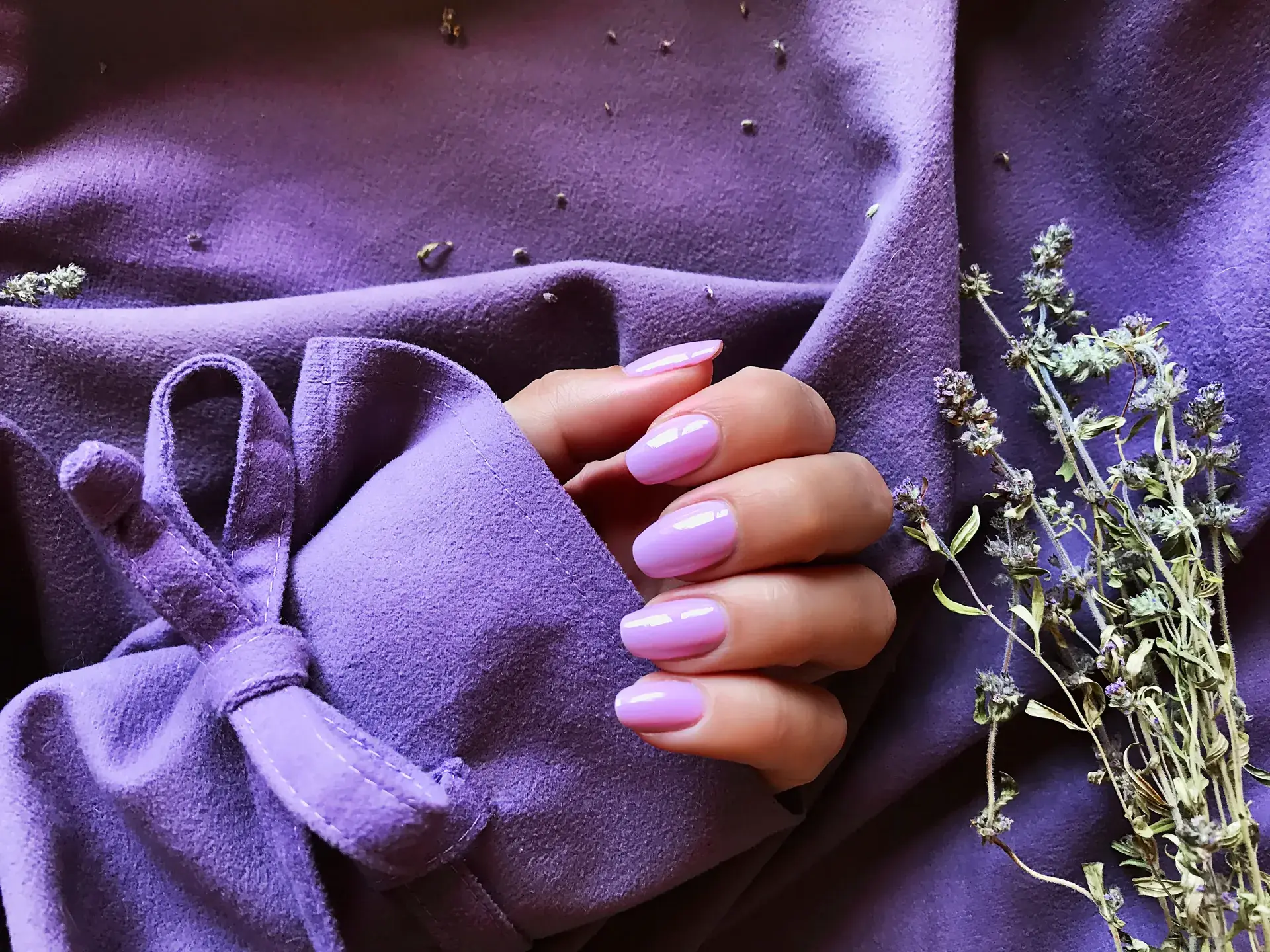 Woman s hand and manicured nails with flowers 2026 03 24 12 39 35 utc